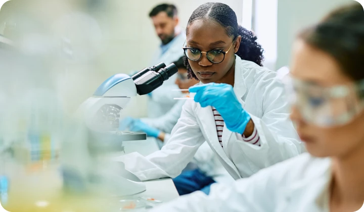 Pharmacists in a laboratory Pharmacists in a laboratory